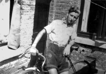 Sid aged 16 with his racing bike at back door Parkdale Road, Plums